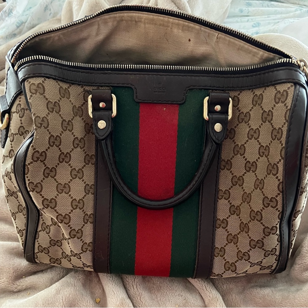 Gucci Top handle bag
Boston cloth handbag
Very good condition
Multicolour, Cloth